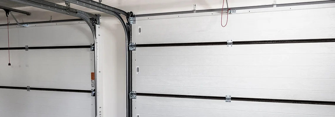 Fix Folding Garage Door Jerking in Tinley Park, Illinois